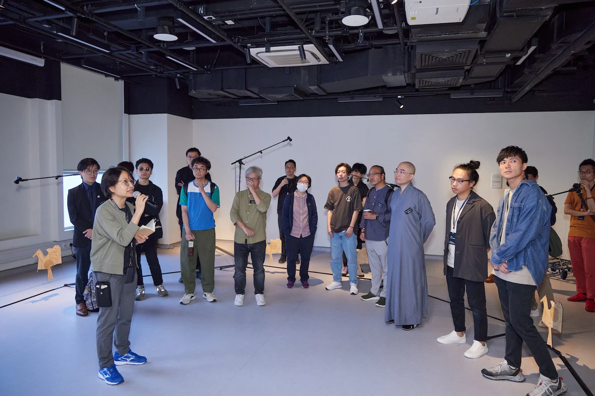 Curator Olive Leung engages the audience with insights about the exhibition "Soundscape of The Loudmouth".