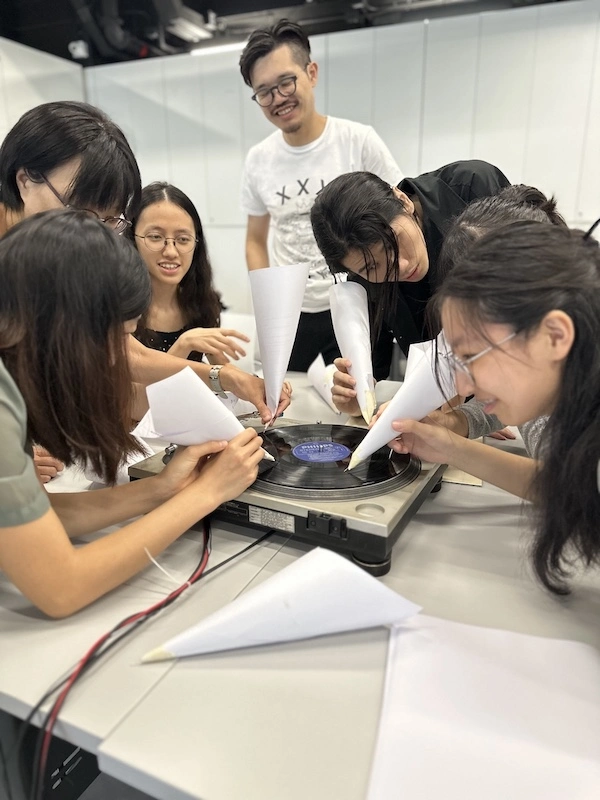 A needle's point, a paper's thinness—and sound is amplified.